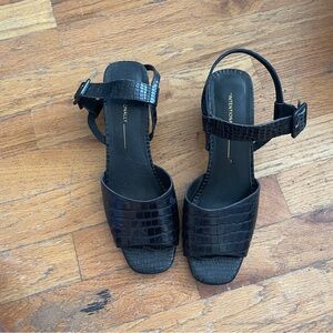 Intentionally blank black block heel